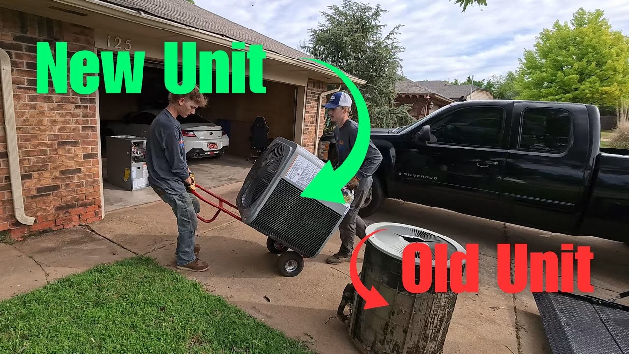 Technicians removing an old AC unit and installing a new energy-efficient HVAC system in Oklahoma.